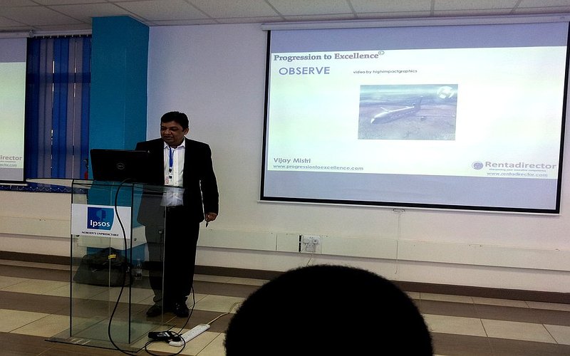 Vijay Mistri facilitating a leadership strategy session with senior executives