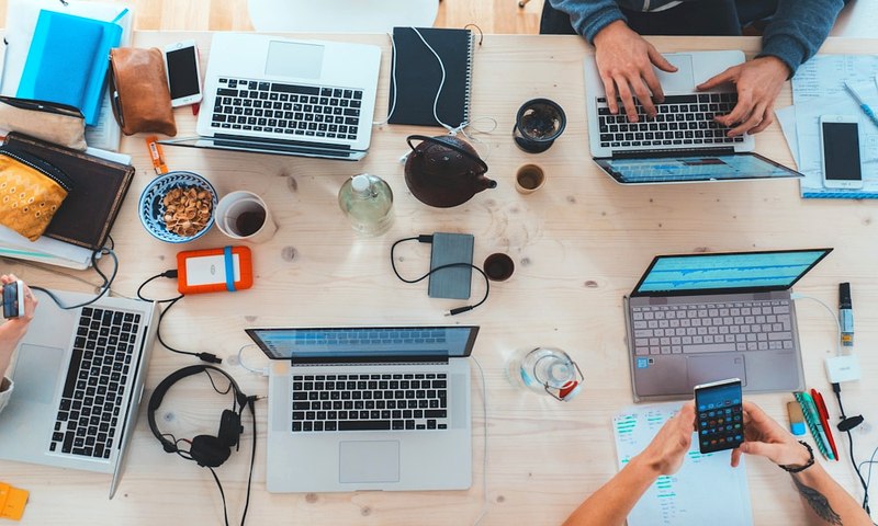 Leadership team waiting for decisions — the Founder Bottleneck causes the entire organisation to move at the pace of one person